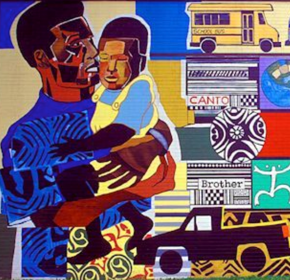 A mural of a father holding a child.